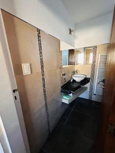 Koupelna v ubytování Confortable Casa en Pilar Rio II + 7 fotografií