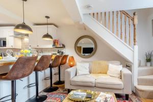 Posezení v ubytování Potters Cottage + 13 fotografií