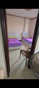 Ένα ή περισσότερα κρεβάτια σε δωμάτιο στο Go egypt