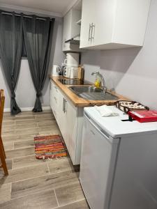 a kitchen with a sink and a counter top at Casa Camacho - Santa Cruz in Santa Cruz +33 photos