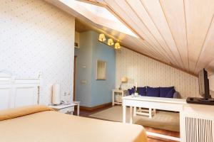 Postel nebo postele na pokoji v ubytování Hotel Azofra