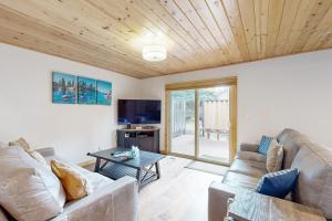 a living room with a couch and a table at Lake Forest Manor in Tahoe City