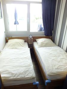 En eller flere senge i et værelse på Frische-Brise-03-02