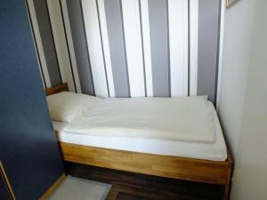 En eller flere senge i et værelse på Frische-Brise-03-02 + 4 billeder