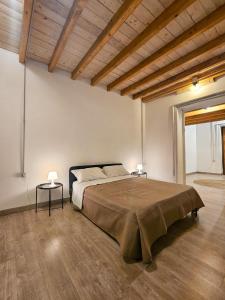 Ένα ή περισσότερα κρεβάτια σε δωμάτιο στο A al Quadrato