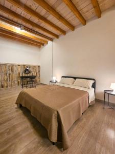 Ένα ή περισσότερα κρεβάτια σε δωμάτιο στο A al Quadrato