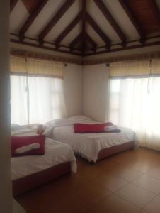 Postel nebo postele na pokoji v ubytování Casa Gloria Country en Villa de Leyva