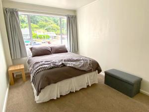 Postel nebo postele na pokoji v ubytování The Corner City Jem