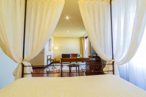 Postel nebo postele na pokoji v ubytování Hotel Azofra