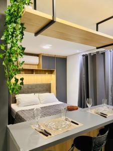 Φωτογραφία από το άλμπουμ του Studio Luxuoso Cama Queen Ar Condicionado e Cozinha Completa σε Mogi das Cruzes
