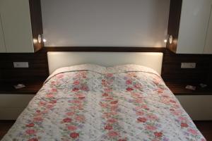 En eller flere senge i et værelse på Apartment Patricia