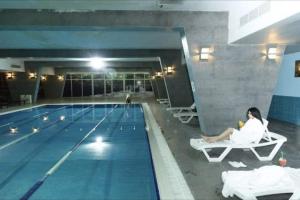 Πισίνα στο ή κοντά στο Ruzi Garden City