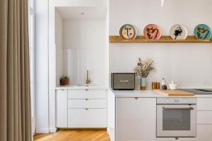 Η κουζίνα ή μικρή κουζίνα στο Beige Hospitalité - Apothéose Luxueux- 3 chambres - parking privé