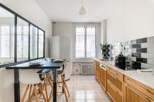 Kuchyň nebo kuchyňský kout v ubytování Louisa - 3Rooms - centre-ville tram + 28 fotografií
