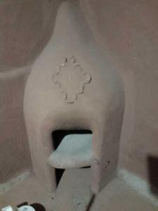 a model of a toilet in a bathroom at Palta Wasi in Taray
