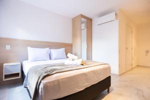 Postel nebo postele na pokoji v ubytování 360 Mirant Vila Madalena