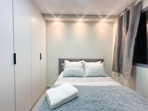 Ένα ή περισσότερα κρεβάτια σε δωμάτιο στο Apartamento moderno para até 4 pessoas Barra Funda