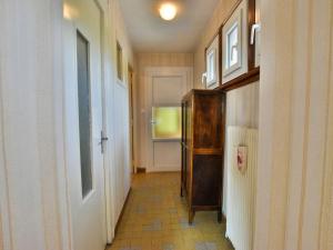 a hallway with a room with a door and a window at Appartement à Neuvecelle avec balcon, parking et vue lac - FR-1-498-119 in Neuvecelle