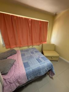 Una cama o camas en una habitación de VIVALaVIDA