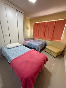 Una cama o camas en una habitación de VIVALaVIDA