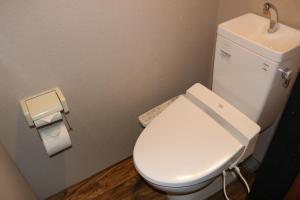 a bathroom with a white toilet and a sink at Nagomi Ryokan Yu - Vacation STAY 81037v in Kyoto +7 photos
