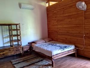 Postel nebo postele na pokoji v ubytování Domi cabin large