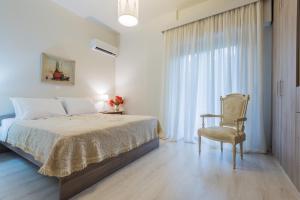 Ένα ή περισσότερα κρεβάτια σε δωμάτιο στο Villa Katrin