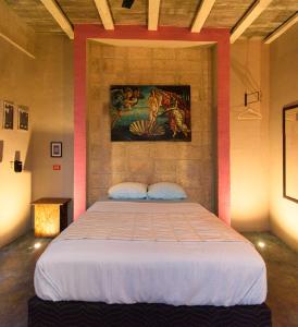 En eller flere senge i et værelse på Habitación frente al mar y alberca