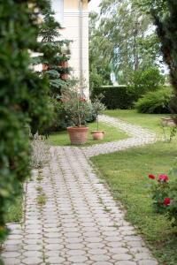 Vonkajšia záhrada v ubytovaní Hotel Zéta