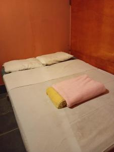 Postel nebo postele na pokoji v ubytování Hostel da Luna