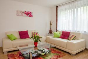 Posezení v ubytování Ferienwohnungen und Zimmer Yassi