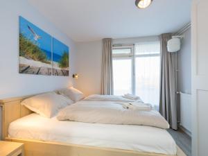 Ένα ή περισσότερα κρεβάτια σε δωμάτιο στο Apartment in Zoutelande near Sandy Beach +22 φωτογραφίες