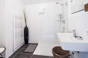 Ένα μπάνιο στο Tauerndorf Enzingerboden Ski in&out - Steinbock Lodges +87 φωτογραφίες