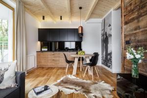 Kuchyňa alebo kuchynka v ubytovaní udanypobyt Apartamenty Dranica