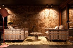 Posezení v ubytování Alexander Charme Hotel