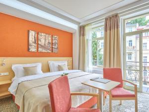 Llit o llits en una habitació de Spa Hotel Iris