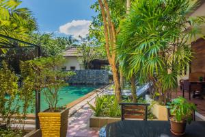 a view of the pool at the resort at Indra Porak Residence Hotel in Siem Reap