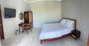 Ένα ή περισσότερα κρεβάτια σε δωμάτιο στο A Brand New Private Villa in Sanur Beach