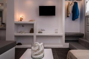 A television and/or entertainment centre at Aerides Mandrakia Milos