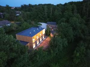 an overhead view of a house with a roof at Feinzeit Naturloft - Klima, Sauna, Design in Frensdorf