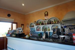 Lounge alebo bar v ubytovaní Hotel Piccolo Pevero