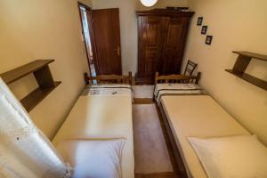 Postel nebo postele na pokoji v ubytování Apartments Tonšić