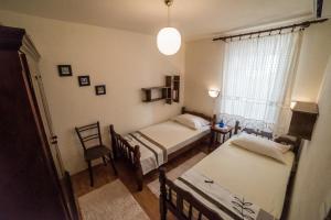 Postel nebo postele na pokoji v ubytování Apartments Tonšić