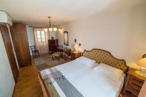 Postel nebo postele na pokoji v ubytování Apartments Tonšić