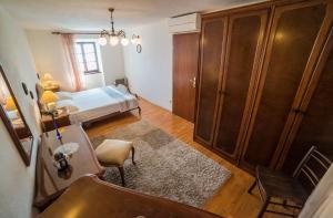 Postel nebo postele na pokoji v ubytování Apartments Tonšić