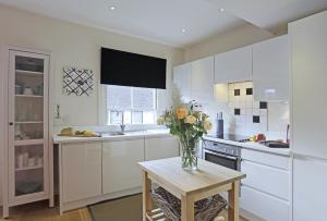 Køkken eller tekøkken på Tillys Place