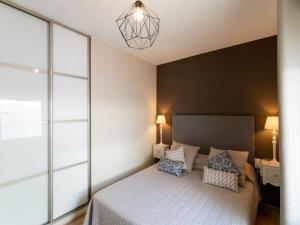 En eller flere senge i et værelse på Magnificent villa with private pool