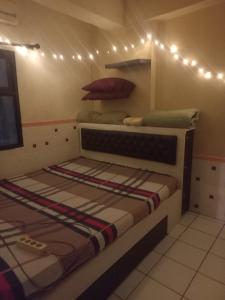 Imagen de la galería de Apartment Kemang View By Roomora, en Pekayon Satu