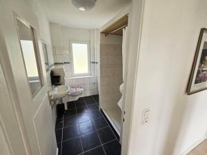 a bathroom with a sink and a toilet at Sun-drenched Apartment in Gondenbrett in Gondenbrett
