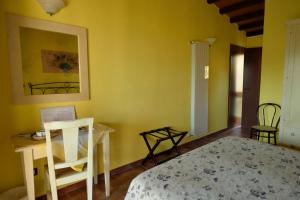 Postel nebo postele na pokoji v ubytování Il Gelsomino Bio Agriturismo